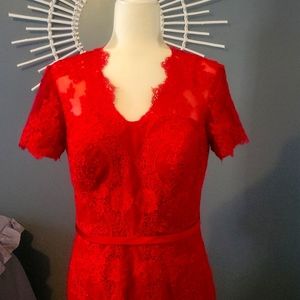 Beautiful sexy lace red dress with small train.